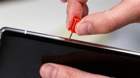 How to open sim tray without pin .